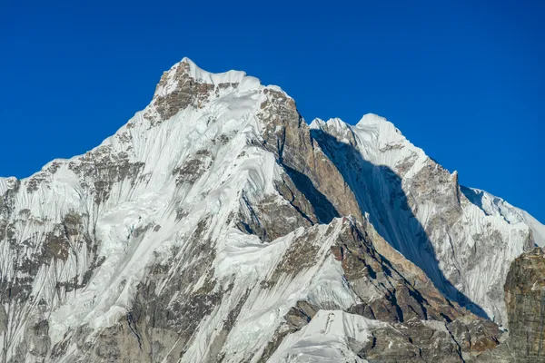 Cho Oyu dominating the skyline above the Ngozumpa Glacier