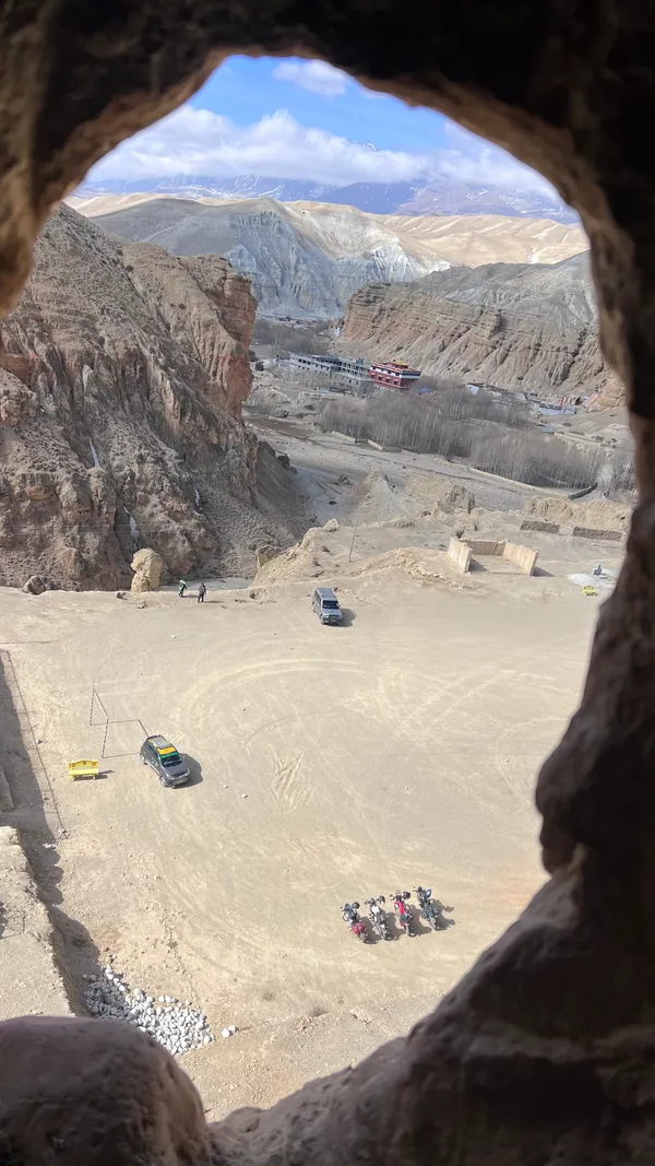 Looking out from Shije Jhong Cave toward Chosar village spread across the valley floor at 3,900 m