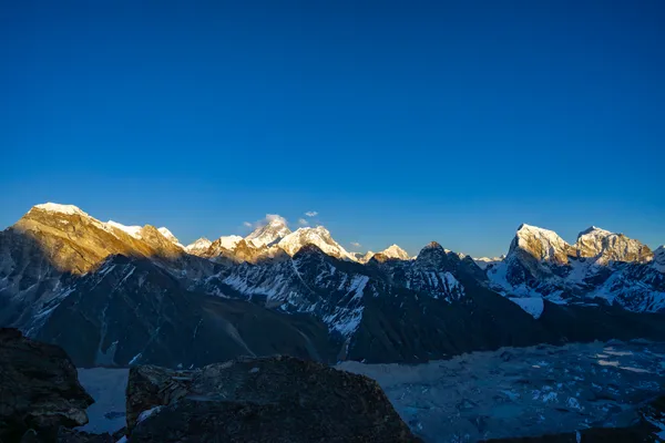 Everest, Lhotse, Makalu, and Cho Oyu stretching across the horizon from Gokyo Ri