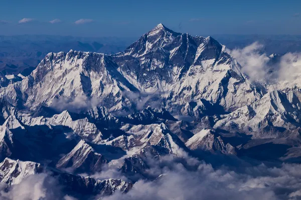 Aerial view of Langtang Lirung and the pyramid-shaped summit of Everest