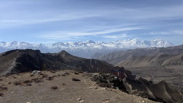 Snow-capped Annapurna and Dhaulagiri ranges dominating the horizon from the Yara highlands at 3,607 m