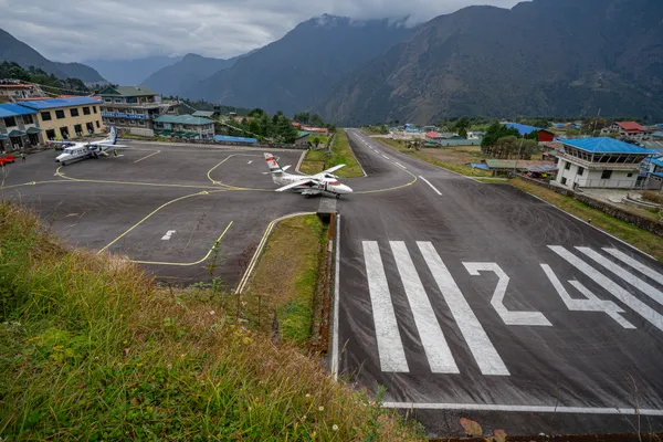 A small aircraft on the runway at Lukla's Tenzing-Hillary Airport