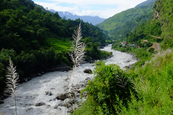 The Marsyangdi River rushing through boulders