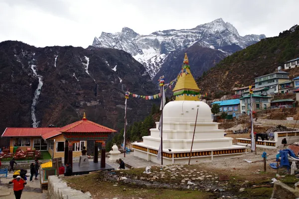 The sacred stupa at Namche Bazaar with peaks in the background