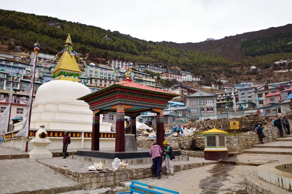 A traditional Buddhist stupa marking the entrance to Namche Bazaar