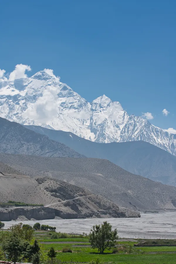 The Nilgiri massifs looming over the wide stony Kali Gandaki riverbed at Chhusang