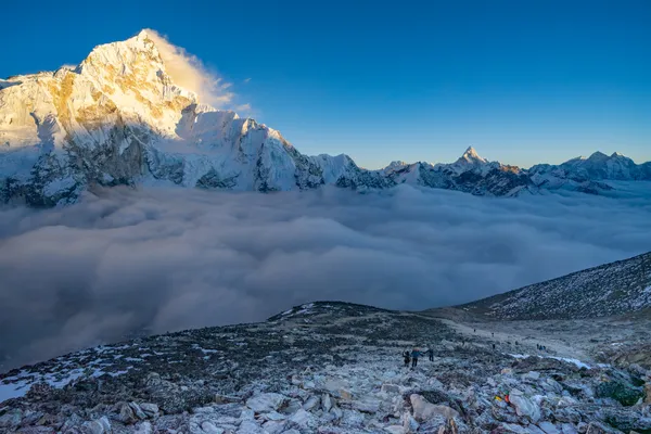 Nuptse at 7,861 m towering over a sea of clouds near Gorak Shep