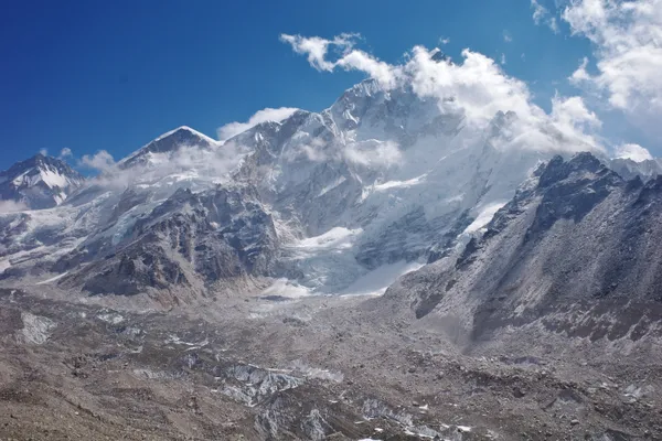 The pyramid-shaped Pumori peak standing guard over the valley