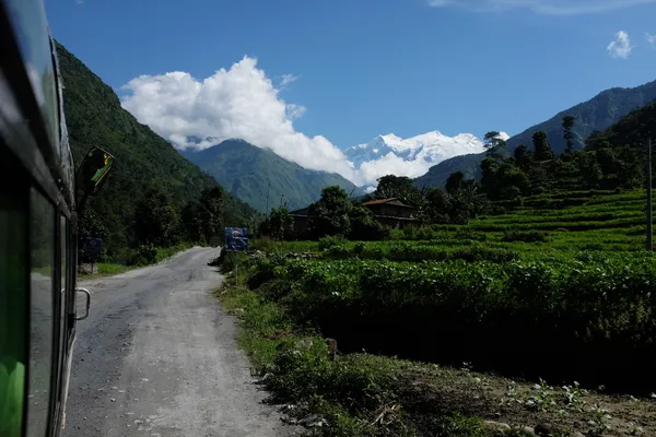 A mountain road through terraced fields