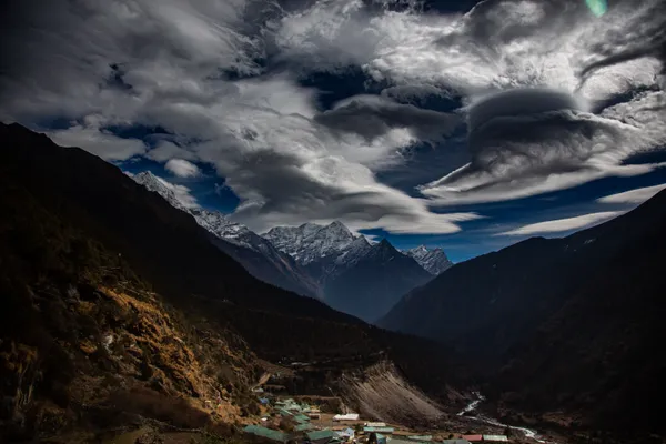Dramatic lenticular clouds above Deboche with Nuptse and Everest
