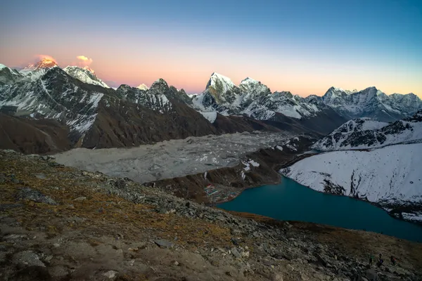 Golden light bathes Everest and Makalu during sunset from 5,357 meters