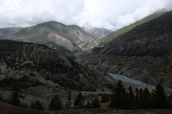 The barren upper valley stretching toward high passes