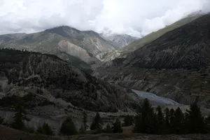The barren upper valley stretching toward high passes
