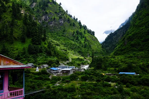 A settlement nestled among green mountains